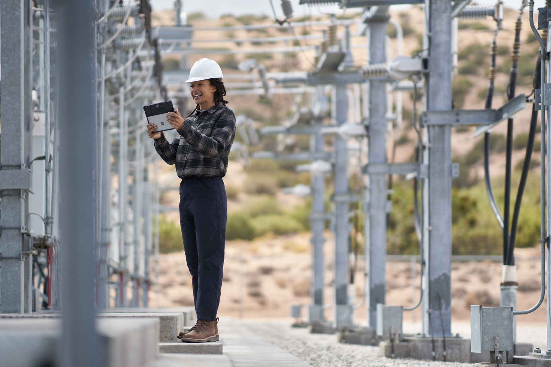 An energy worker working outside